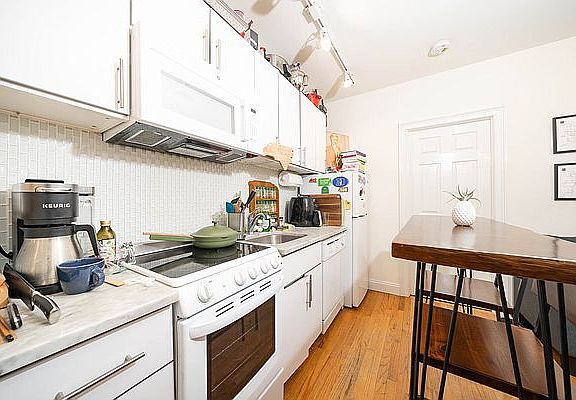 5th image of 239 E 5th St APT 3A