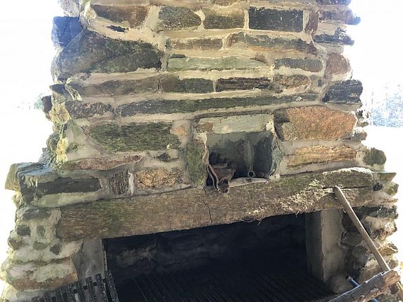 Outdoor fireplace in pavilion 