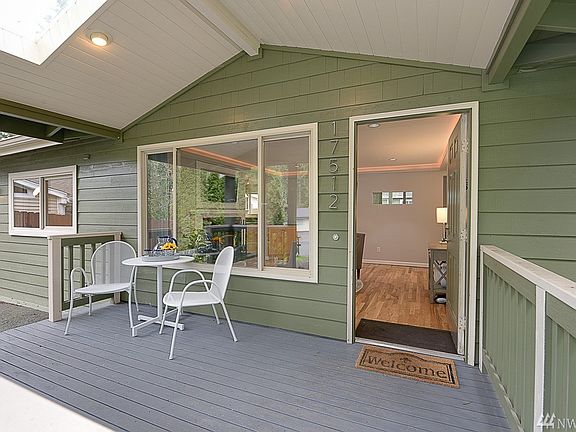 Inviting & spacious covered entry with skylights