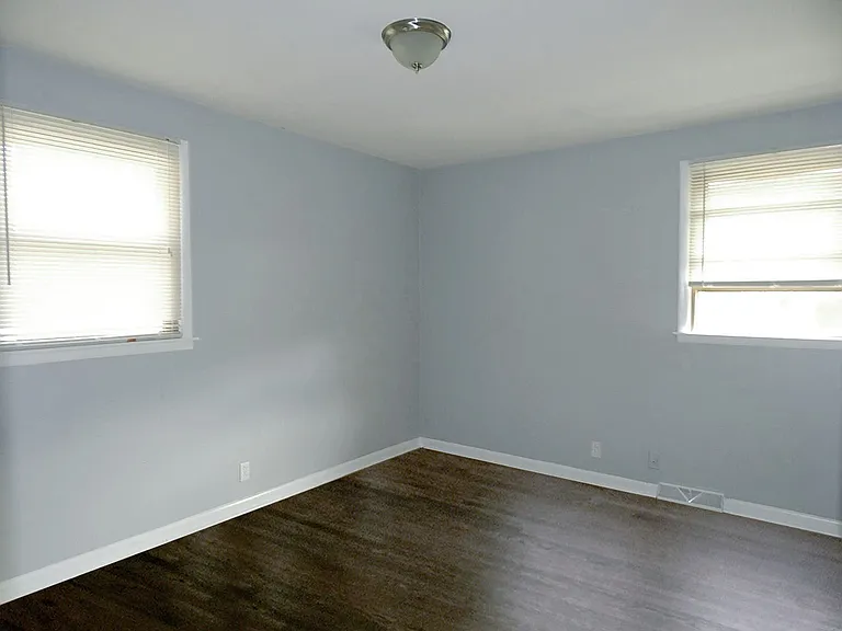 Master bedroom with half bath and extra closet space.