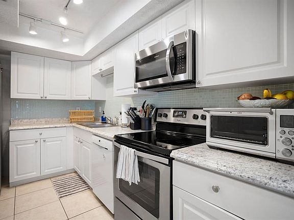 4th image of 654 100th Ave N APT 205