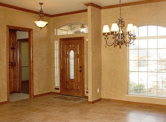 Tiled Entry and Dinning with Real Oak Trim