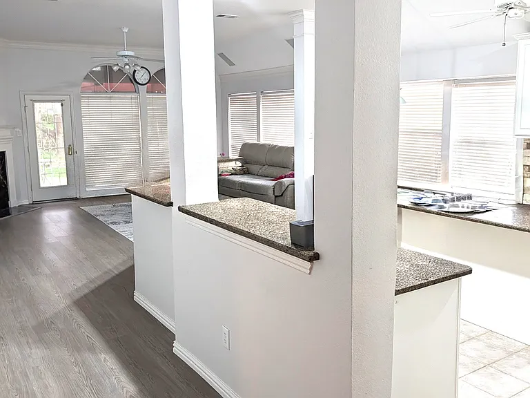 hallway and kitchen and family room