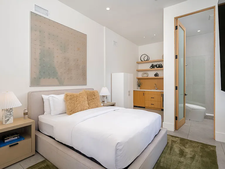 Guest bedroom #3 with a king size bed, Smart TV and full bathroom.