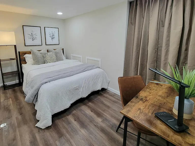 Ensuite conveniently located on lower level near laundry room with ground level entrance.