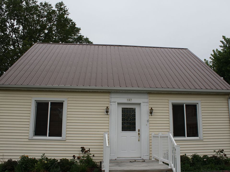 Front of house with new roof