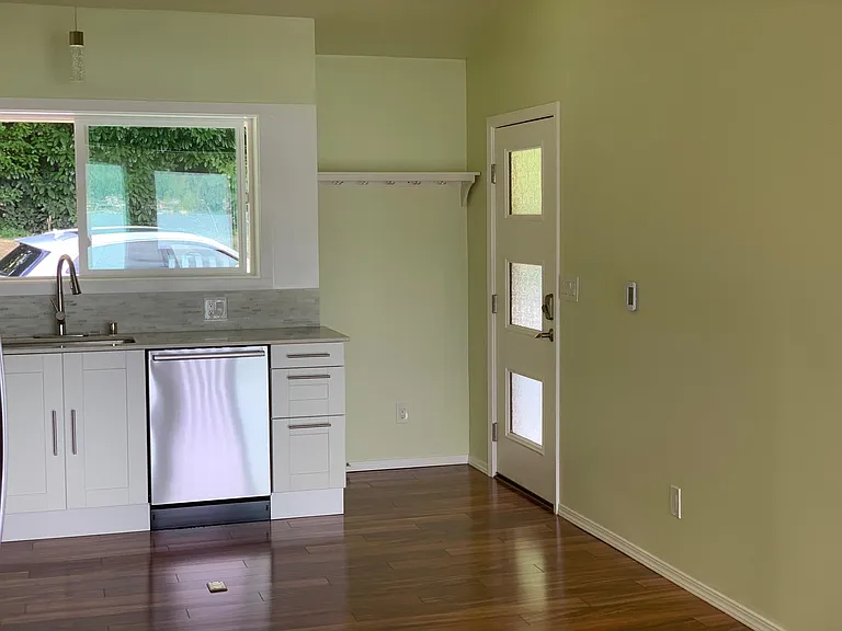 Front Door, View of Street from Kitchen