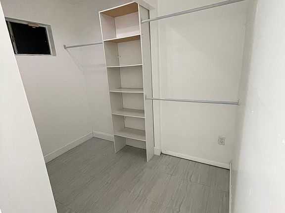 Hers closet in master bedroom