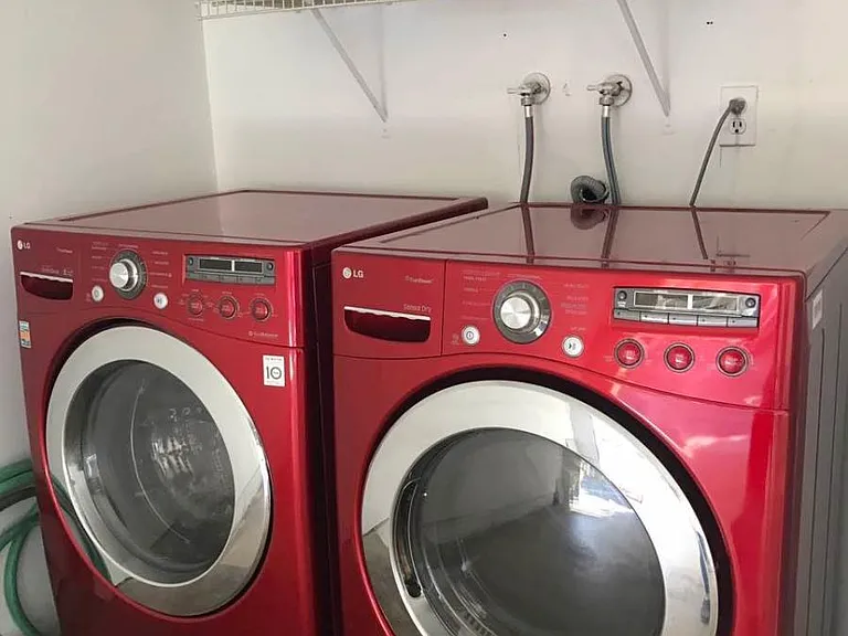 washer and dryer in 2-car garage