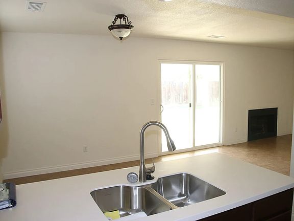 View from kitchen into living and dining areas