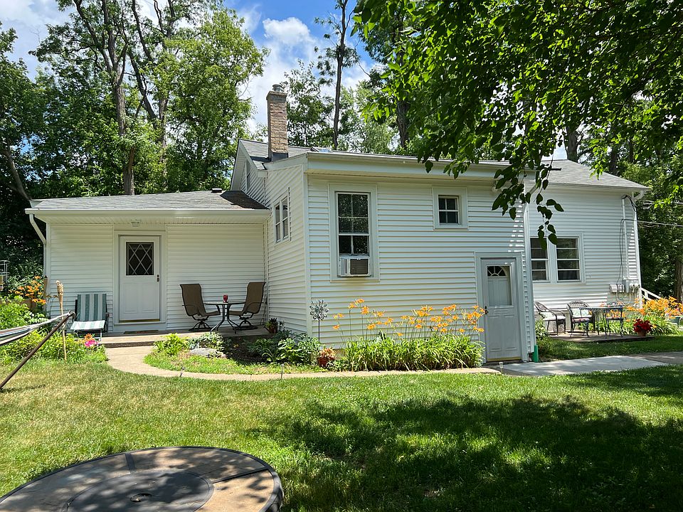 Rear entry. 
15' x 10' covered porch.
West facing.