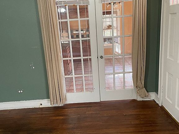 French Doors open to kitchen