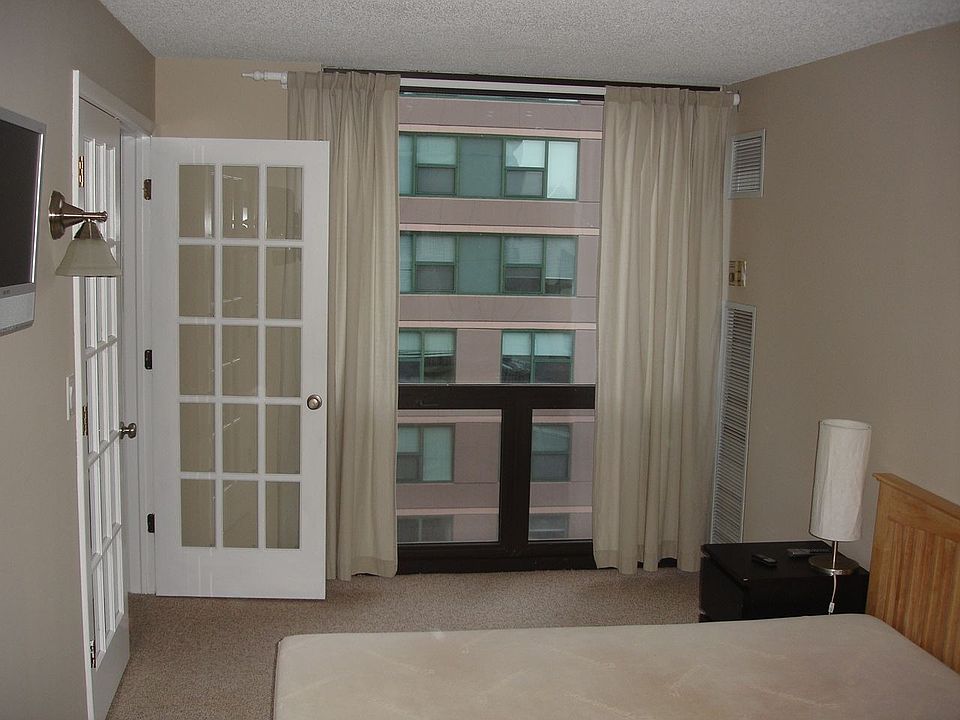 Bedroom is large (9' x 18') and includes a closet / built-in TV