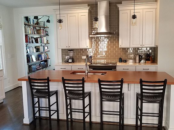 Gourmet kitchen with 9' butcher block island. Electrolux Induction range.