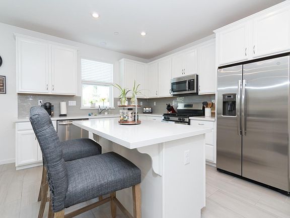 Kitchen includes refrigerator