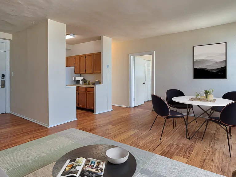 Spacious living room with wood flooring