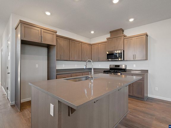 4th image of 6111 Henshaw 55 St SE