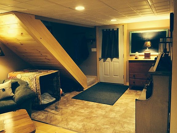 Mudroom; opens into living room.