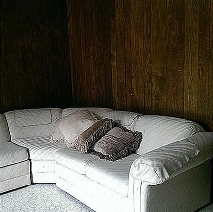 Large 14X20 den with fireplace and french door to back yard.