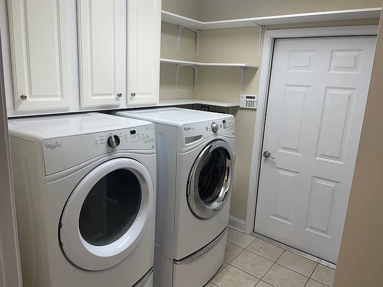 Laundry room off kitchen to garage