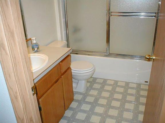 Convenient 1/2 bath downstairs near kitchen and living room.