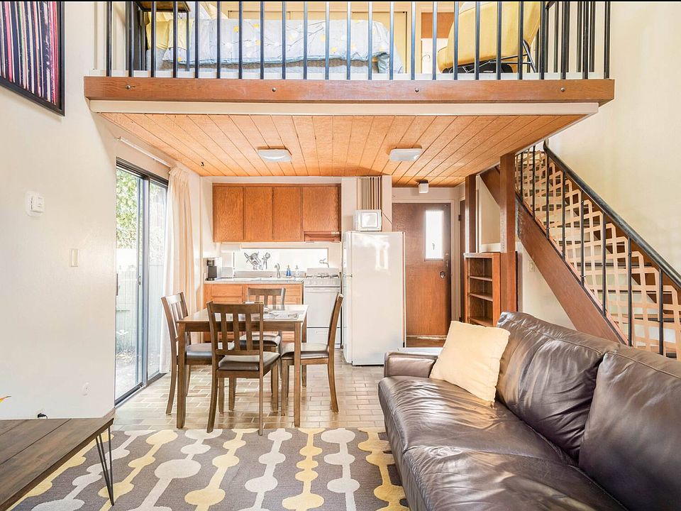 Loft-style apartment, with bedroom upstairs and living room/kitchen downstairs