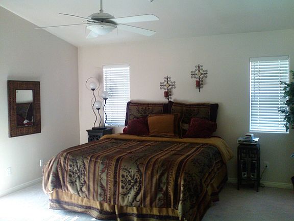 Master bedroom with vaulted ceilings