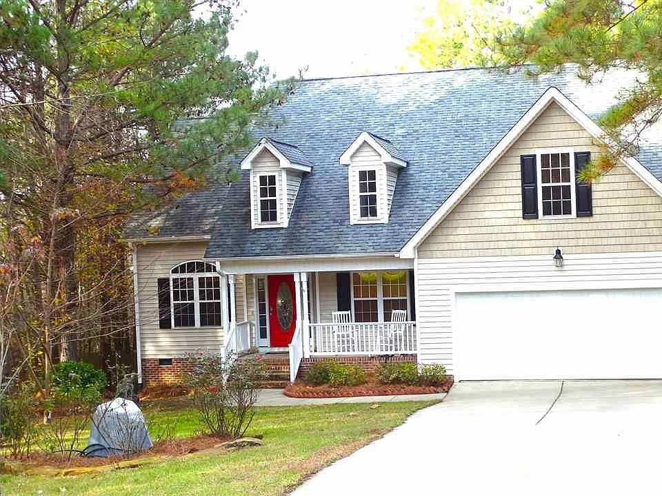 Welcome Home! At the end of the cul-de-sac is your new home, nestled in the wooded lot, just waiting for you!