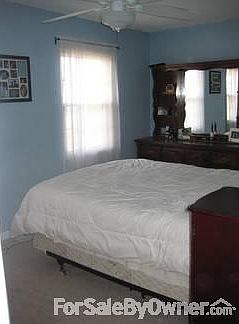 Bedroom
						:
						This is an alternate set-up of the largest of the three secondary bedrooms.
