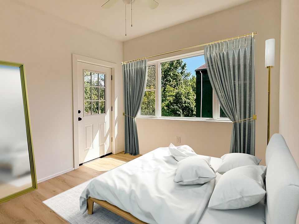 Primary bedroom with furniture