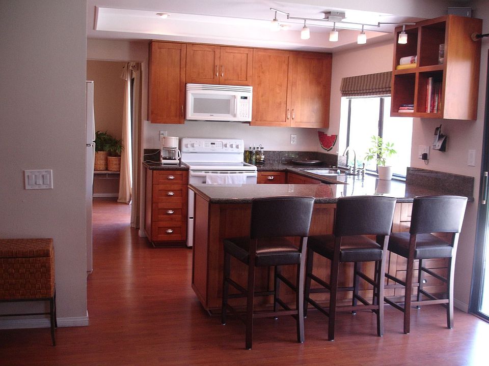 Kitchen remodel includes newer appliances and granite