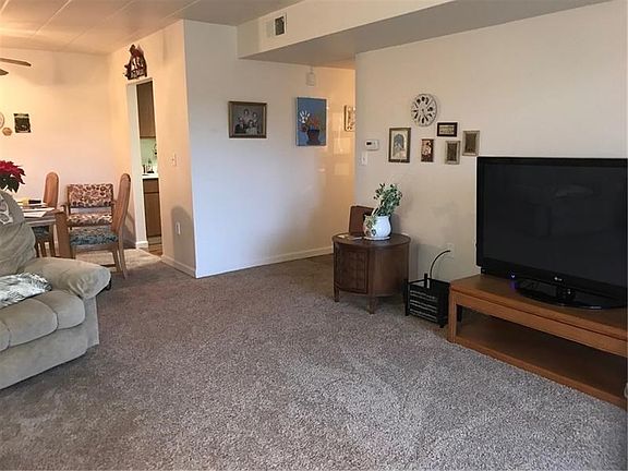 Another view of Living Room looking into dining Room.