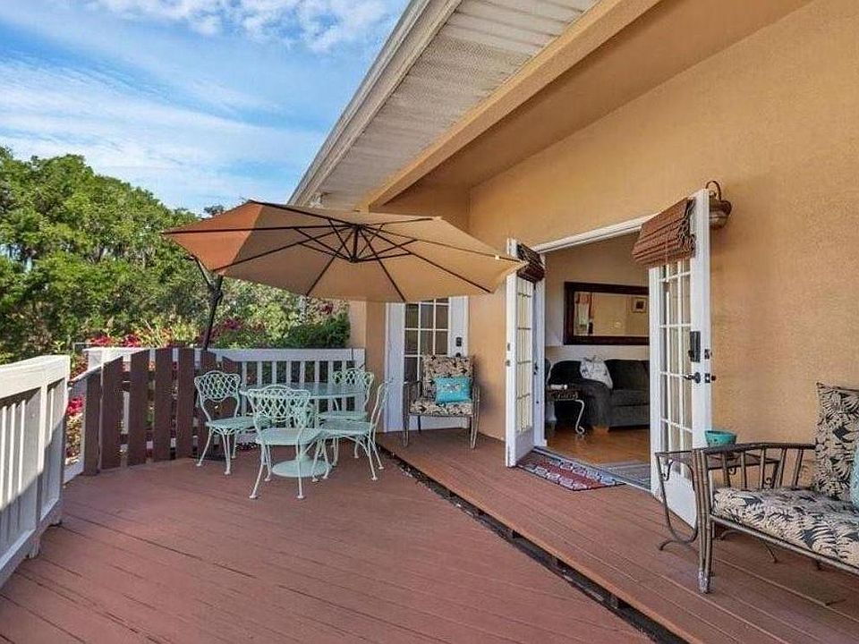 Private patio at the top of the staircase; french doors lead into apartment. Condo comes furnished or unfurnished--see detials for lease pricing.