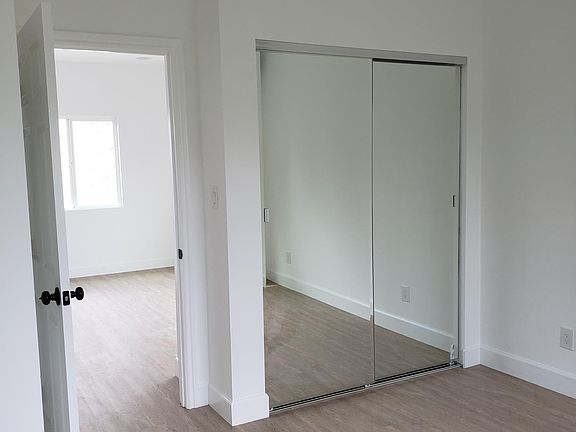 This bedroom has access to the bathroom inside the bedroom. Outside that door, you can see the living room. Will post more pics.
