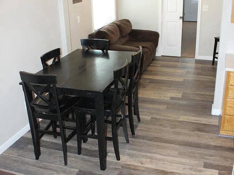 Spacious eating area attached to kitchen.