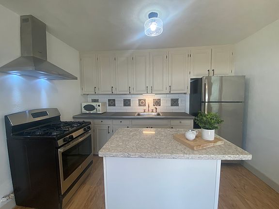 Newly painted original cabinets with new hardware