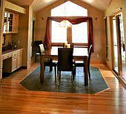 Formal dining room opens to deck