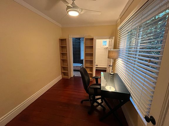 The closet light in the office has a power outlet in it and it's light has a dimmer.