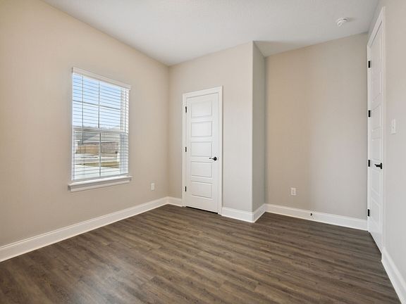 Secondary bedroom in the Brooks floorplan at a Meritage Homes community in Gulfport, MS.
