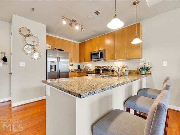 5th image of 711 Cosmopolitan Dr NE Unit 622
