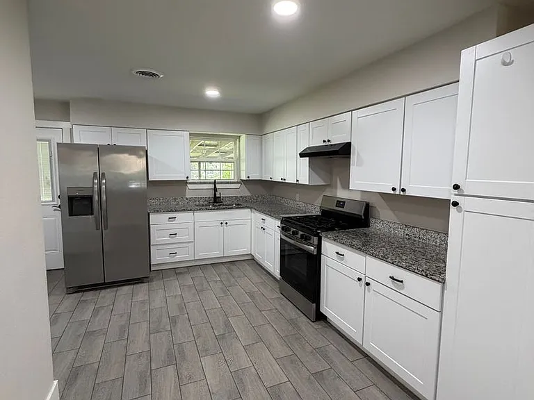 7825 Dugan St — Photo 5