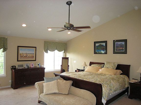 Master bedroom with vaulted ceiling