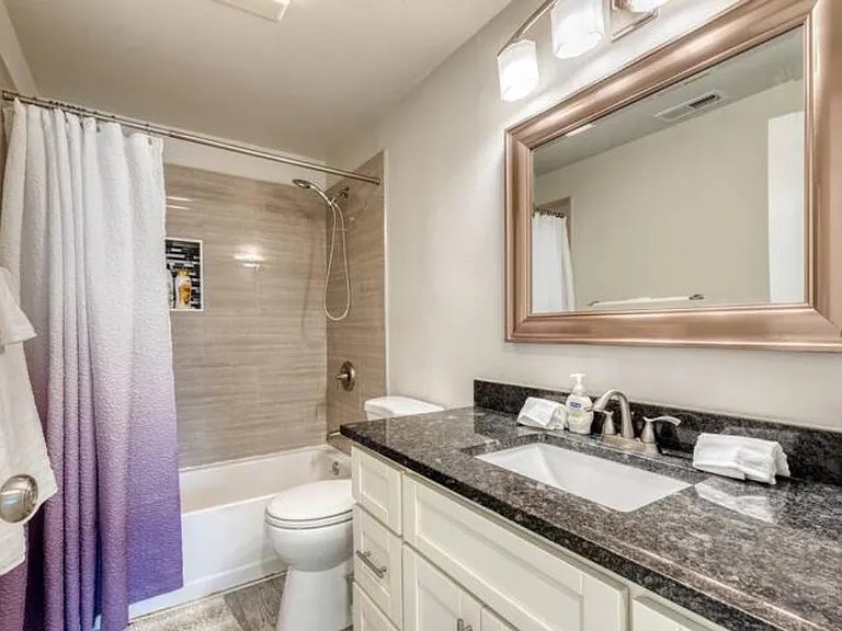 Full Bathroom in hallway with big vanity and countertop for extra space