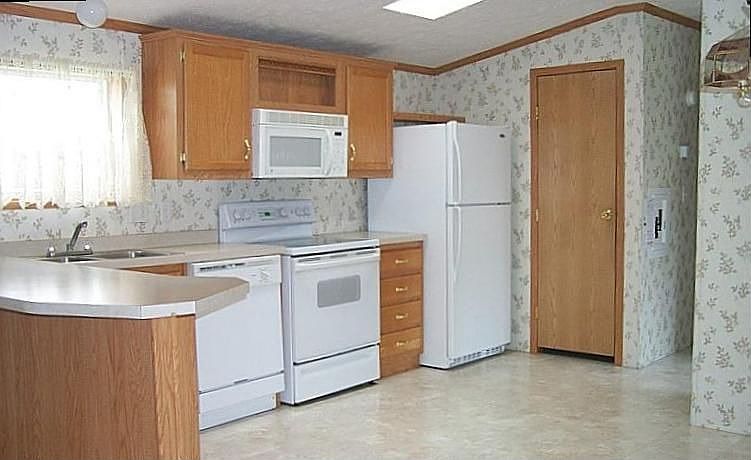 Beautiful oak sun filled kitchen with skylight