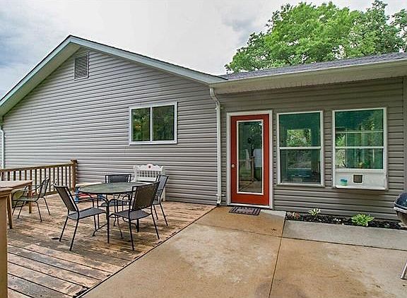 Come entertain with this deck and patio just off the sun room!!