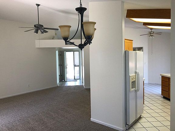 From dining-area to kitchen and living room, foyer.