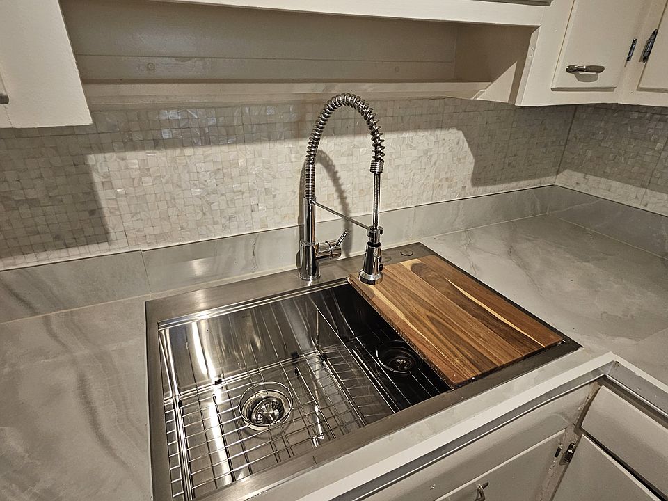 Modern kitchen sink, double basin, with cutting board insert