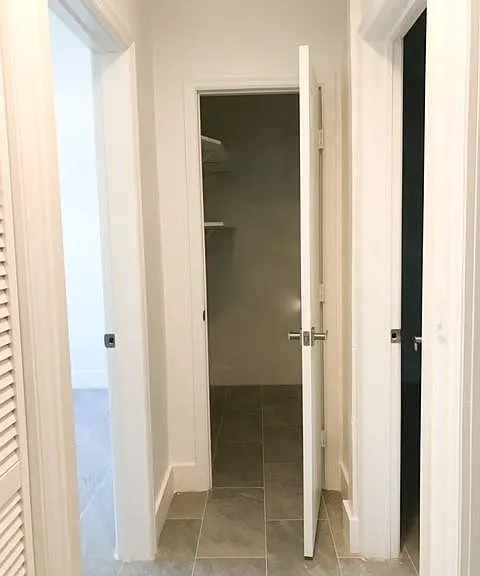 Hall closet with shelves for extra storage