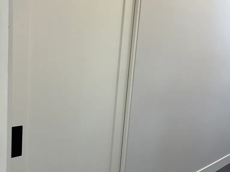 Mudroom soft close pocket door to garage