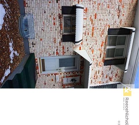 Brick front townhome.